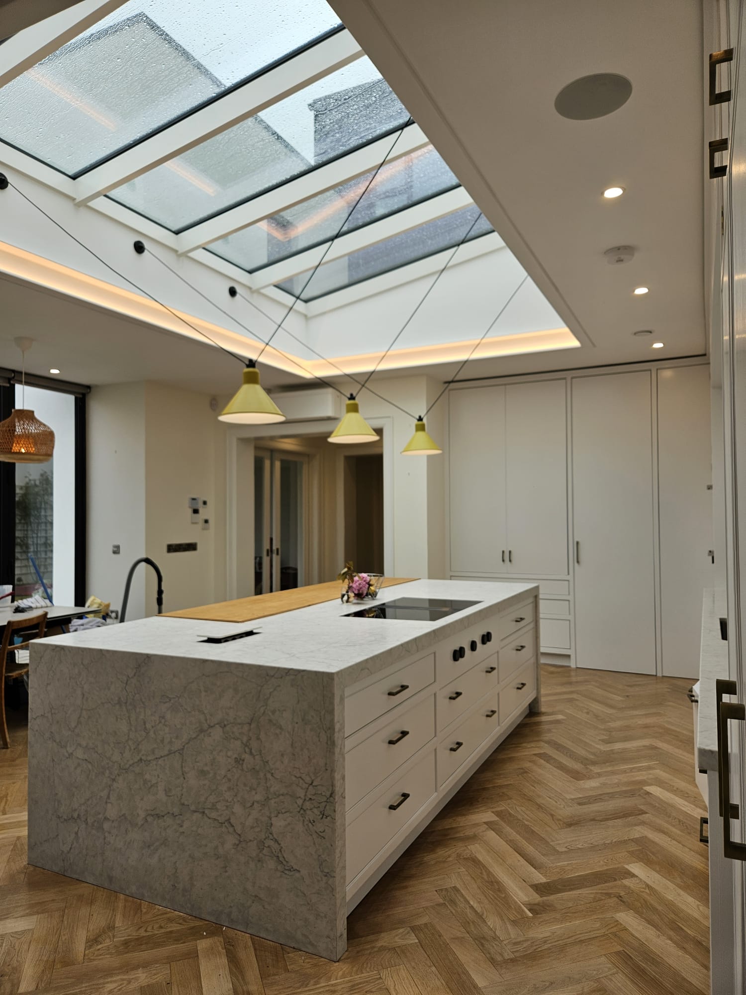 Luxury hand painted kitchen with marble island and skylight in Limerick